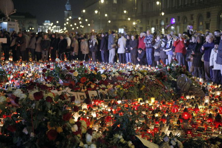 People mourn the late Polish president