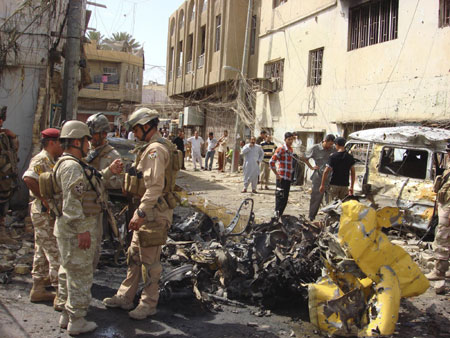 Death toll of Baghdad blasts rises to 52