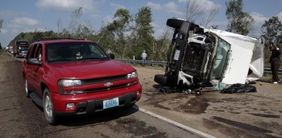 Tornadoes tear through Southeast US, killing 10