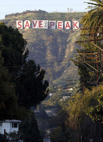 Playboy's Hugh Hefner helps rescue Hollywood sign