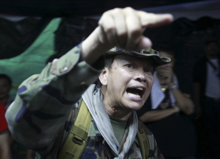 Aide: Thai Red Shirt security chief shot in head