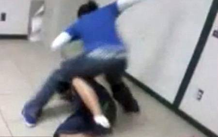 Texas teacher filmed beating pupil; family sues