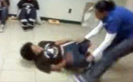 Texas teacher filmed beating pupil; family sues