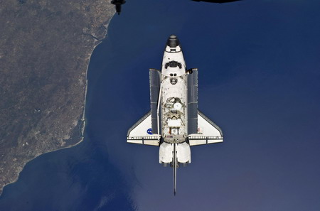 Spacewalk hit by brief power outage, no danger