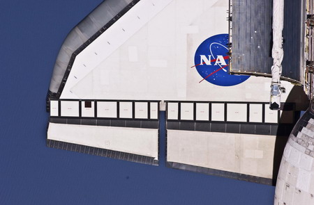Spacewalk hit by brief power outage, no danger