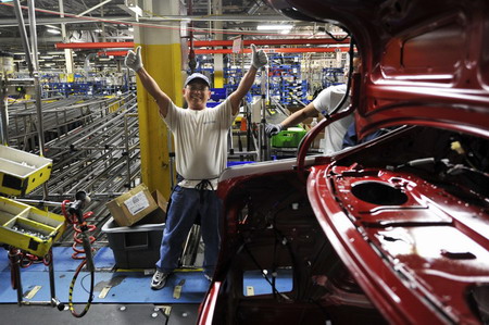 GM roars back to profit, but can it repay?