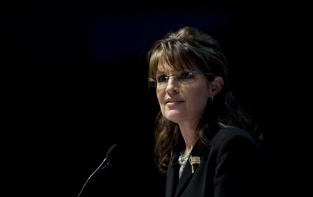 Palin makes good on fence threat