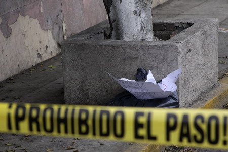 Suspected drug gangs dismember Mexico warden