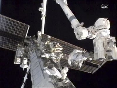 Astronauts pull off broken pump