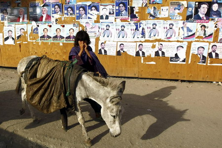 Taliban vow to disrupt Afghan election