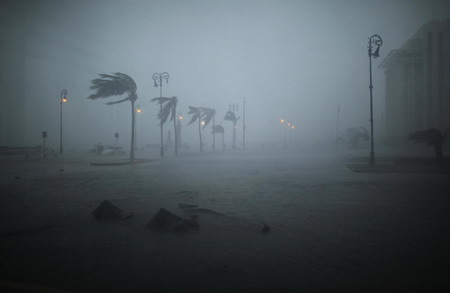Karl kills 2 in Mexico, weakens to tropical storm
