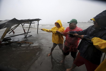 Karl kills 2 in Mexico, weakens to tropical storm