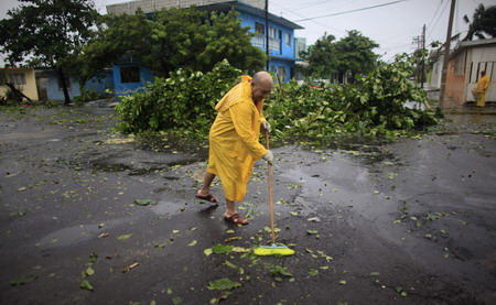 Karl kills 2 in Mexico, weakens to tropical storm