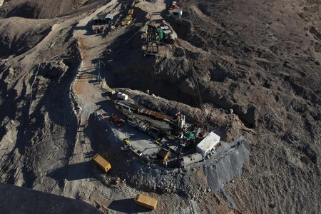 Escape shaft nearly reaches Chilean miners