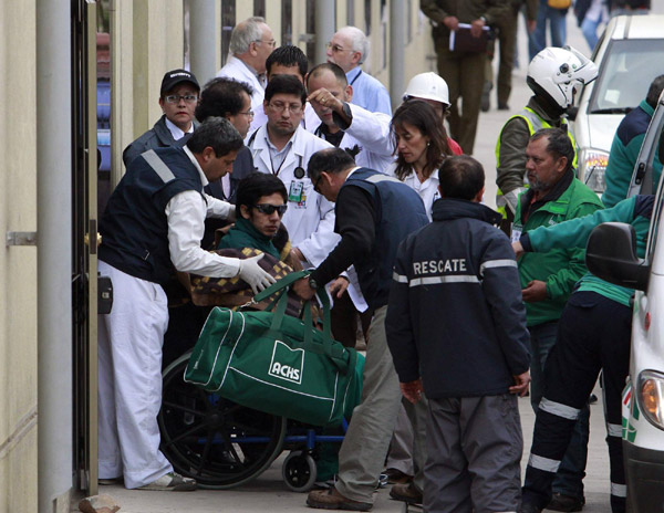 13th trapped Chilean miner brought to surface