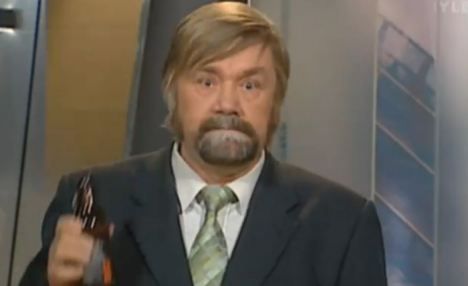 Finnish anchorman sacked for swigging live on air