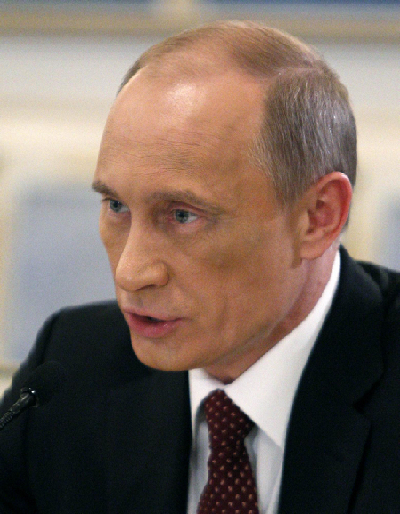 Bruised Putin faces down plastic surgery rumors