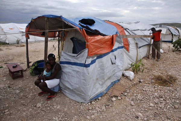 Confusion, fear as Haiti camps evacuate for storm