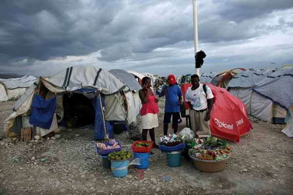 Confusion, fear as Haiti camps evacuate for storm