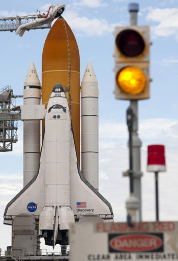 NASA fuels space shuttle Discovery for last launch