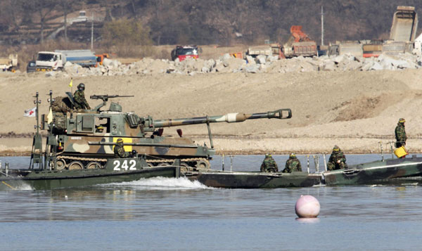 DPRK shells ROK island; Seoul on high alert