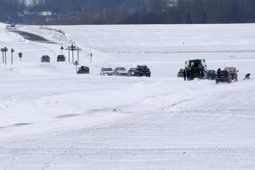  stuck along a snow covered country road near Arras, after heavy snow ...