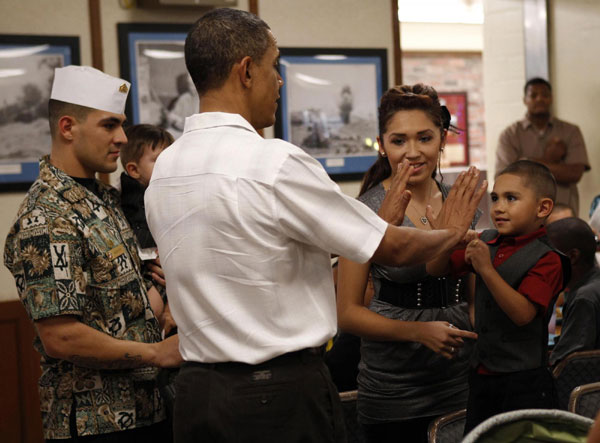 Obama caps Christmas by visiting US troops