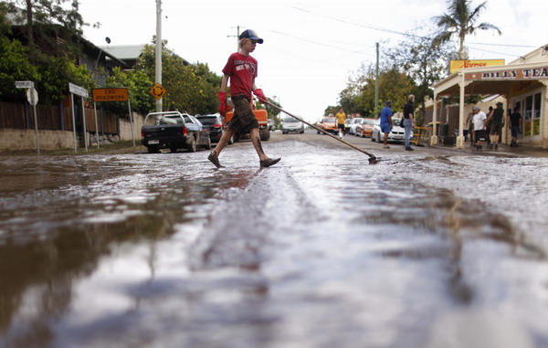 Australia floods recede to reveal extent of damage