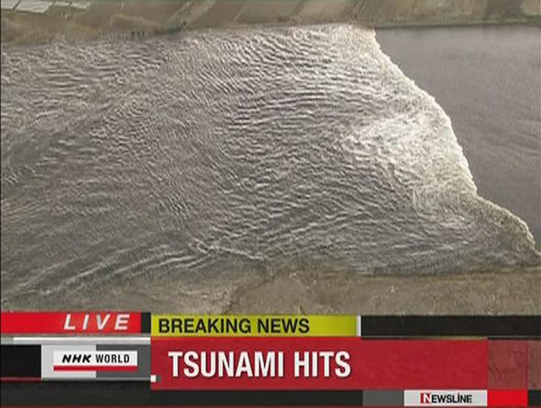 Tsunami hits, one reported dead after Japan quake