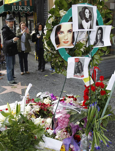 Family, friends hold funeral for Elizabeth Taylor