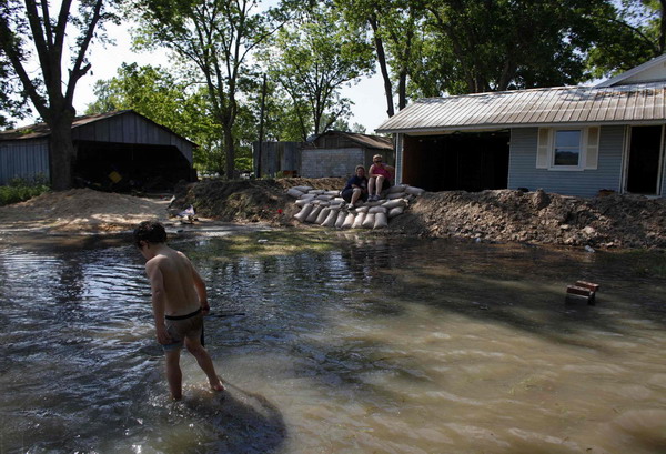 Floodwaters rise in the poverty-stricken Delta