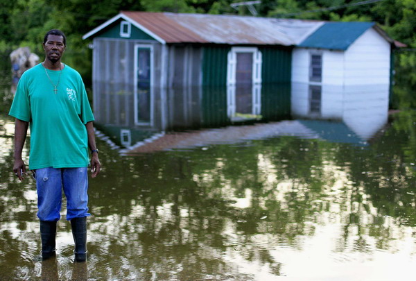 Floodwaters rise in the poverty-stricken Delta