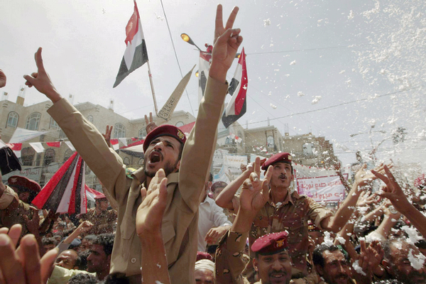 Cheers, gunfights in Yemen as Saleh goes to Saudi
