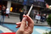 Smoking moms lower 'good' cholesterol in kids