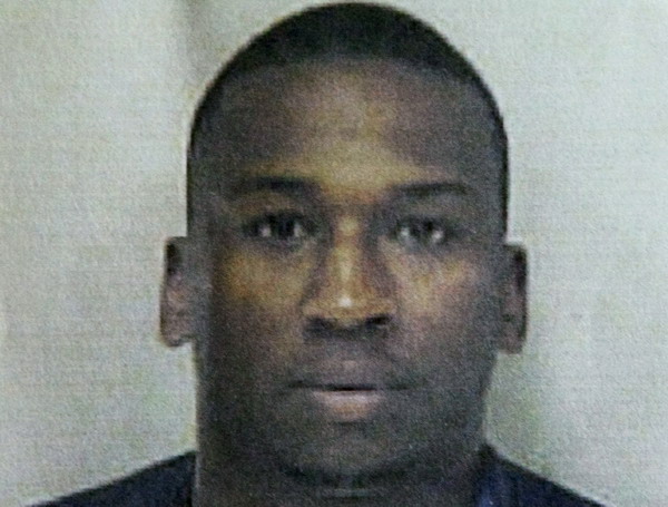 2 held hostage by suspected killer of 7 in Michigan city