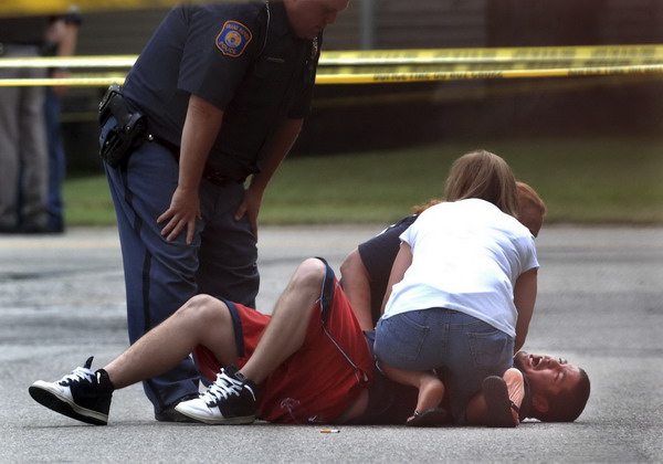 2 held hostage by suspected killer of 7 in Michigan city