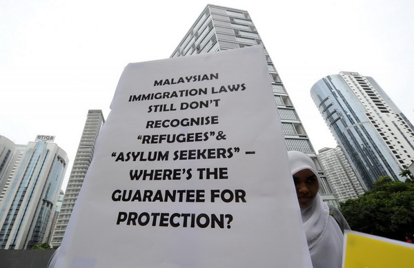 Malaysia, Australia sign refugee exchange pact
