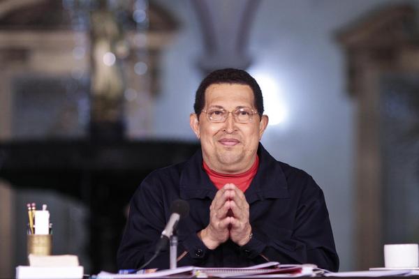 Eying support, Venezuela's Chavez urges moderation