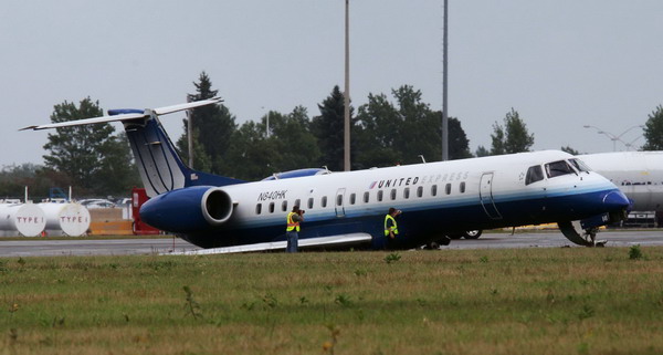 United Express plane skids off runway