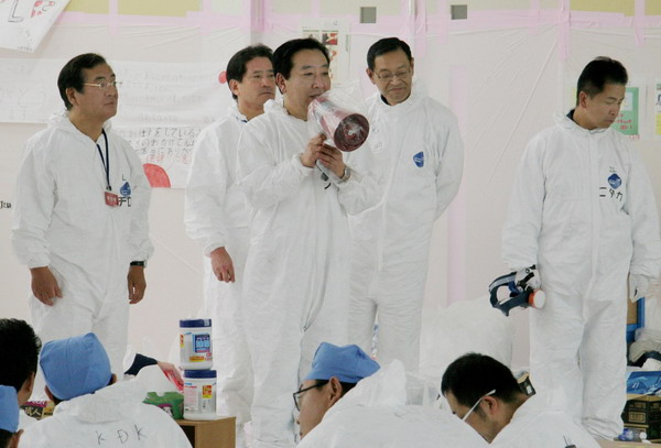 Japan PM visits disaster-hit areas, thanks military