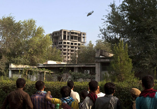 NATO, Afghan forces still battling Taliban attackers