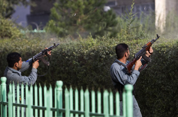 NATO, Afghan forces still battling Taliban attackers