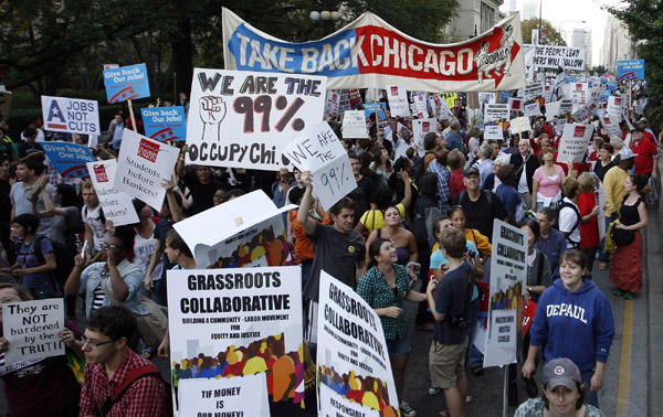 Chicago protests slam bankers to beat of brass band