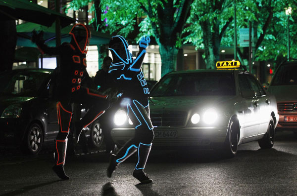 Dancers on Berlin Lights display