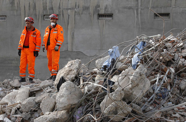 Another teacher pulled from rubble