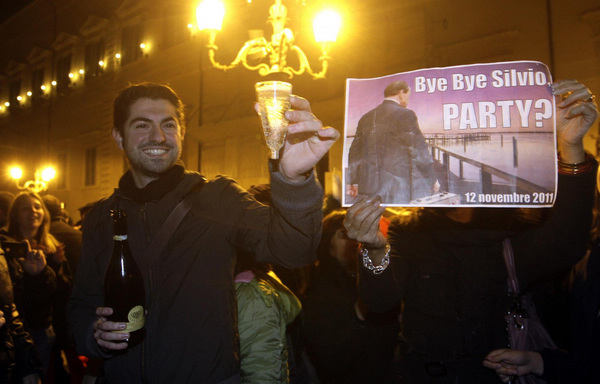 Berlusconi resigns, crowds in Rome celebrate