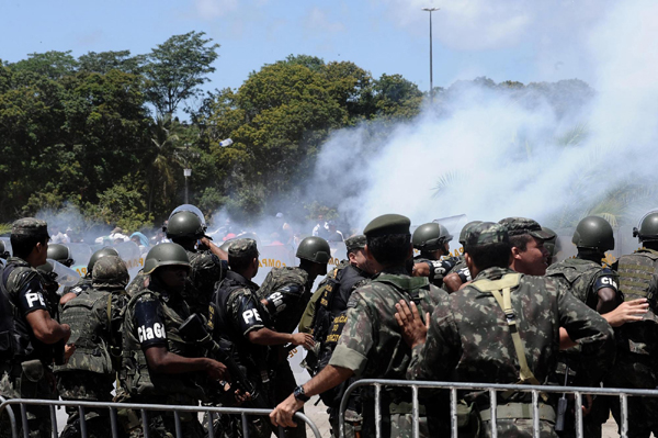 6 injured as soldiers clash with police in Brazil