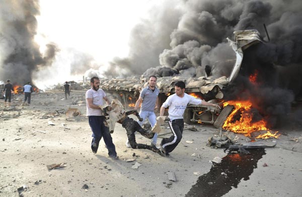 Suicide car bombers kill 55 in Damascus -govt