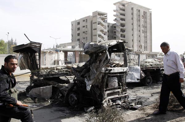 Suicide car bombers kill 55 in Damascus -govt