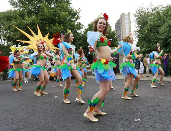 Performers dance at the Notting Hill Carnival